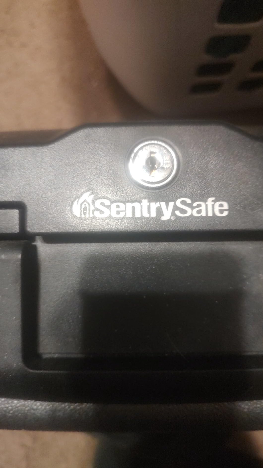 SentrySafe Fireproof Safe with Key Lock, Chest Lock Box for Home or Travel Secures Money, Documents, 0.18 Cubic Feet, 6.1 x 14.3 x 11.2 Inches, 1210 customer photo 1