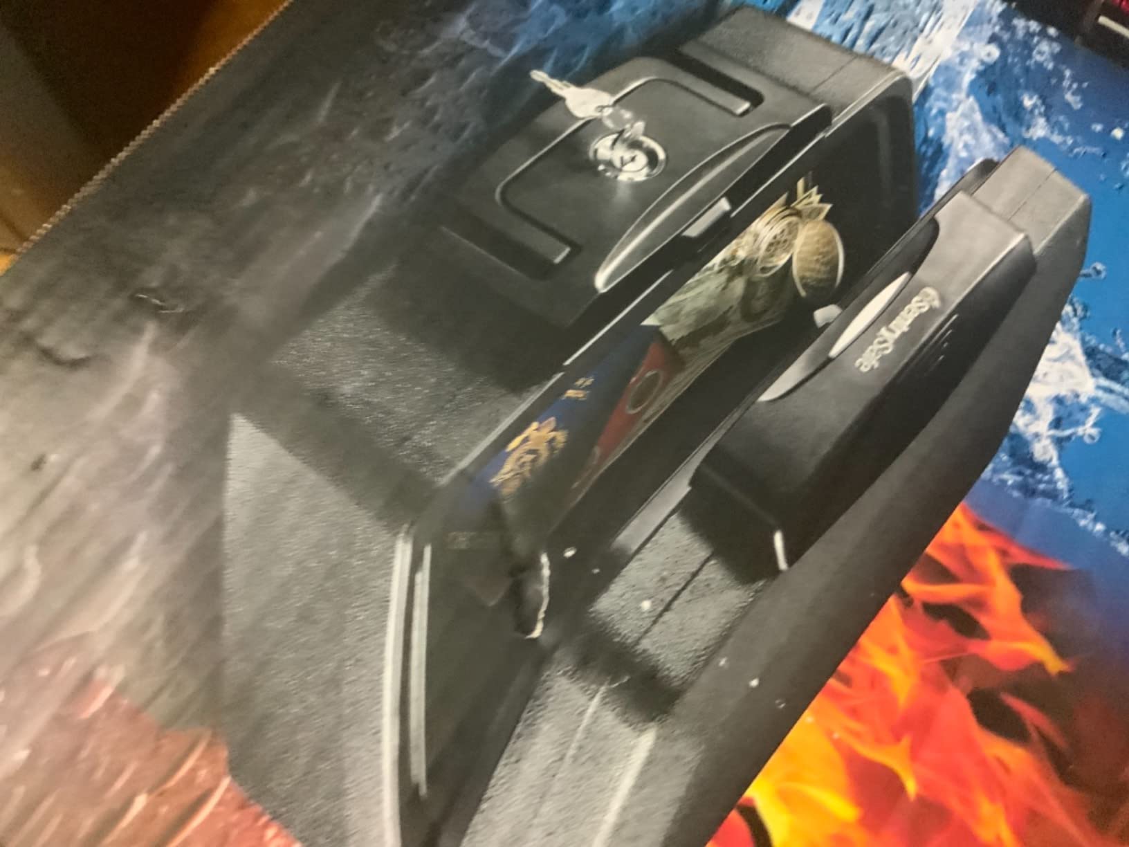 SentrySafe Fireproof and Waterproof Safe, Black Portable Lock Box with Key Lock and Carrying Handle for Money, Passport, Exterior: 14.3 in W x 13 in D x 6.1 in H, ‎H0100 customer photo 1