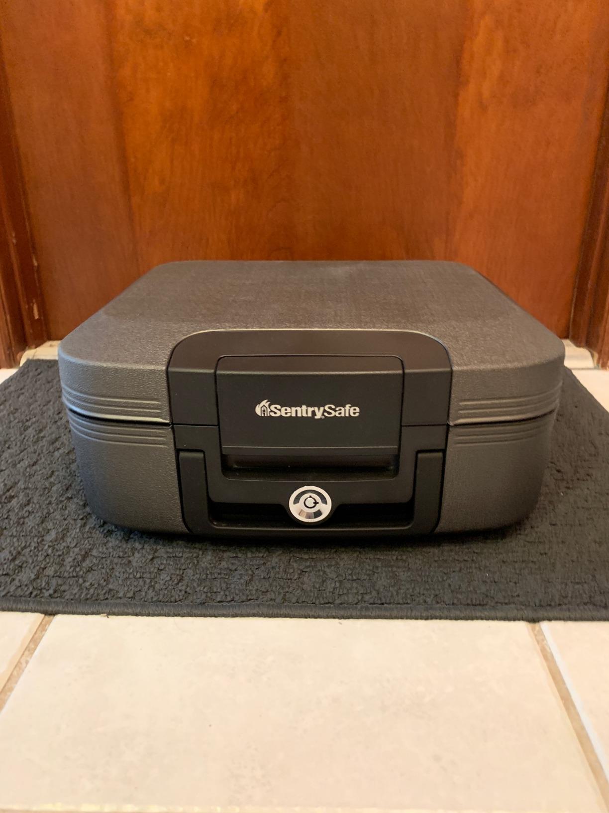 SentrySafe Charcoal Gray Fireproof and Waterproof Safe Box with Key Lock, Portable Chest for Money, Passport, 0.28 Cubic Feet, 6.6 x 15.4 x 14.3 Inches, CHW20221 customer photo 2