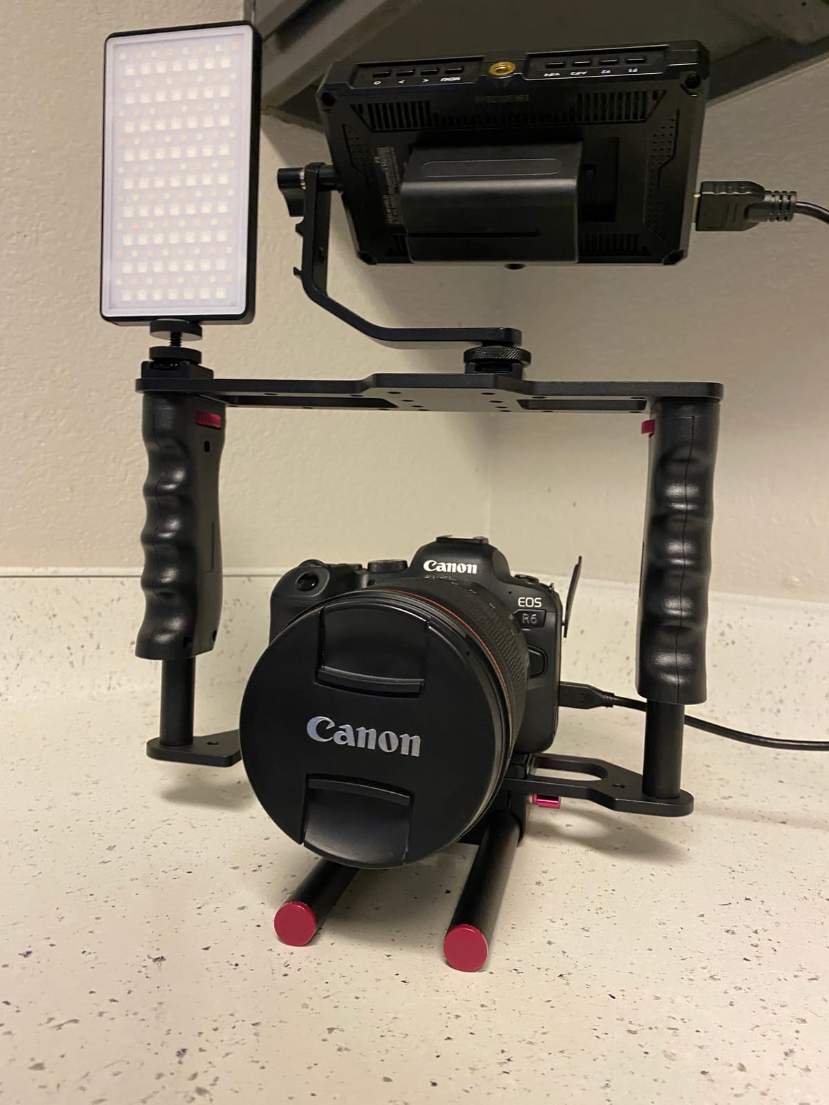 NEEWER Camera Video Cage Film Movie Making Kit, Aluminum Alloy with Top Handle, Dual Hand Grip, Two 15mm Rods, Compatible with Canon Sony Fujifilm Nikon DSLR Camera and Camcorder (Black + Red) customer photo 1