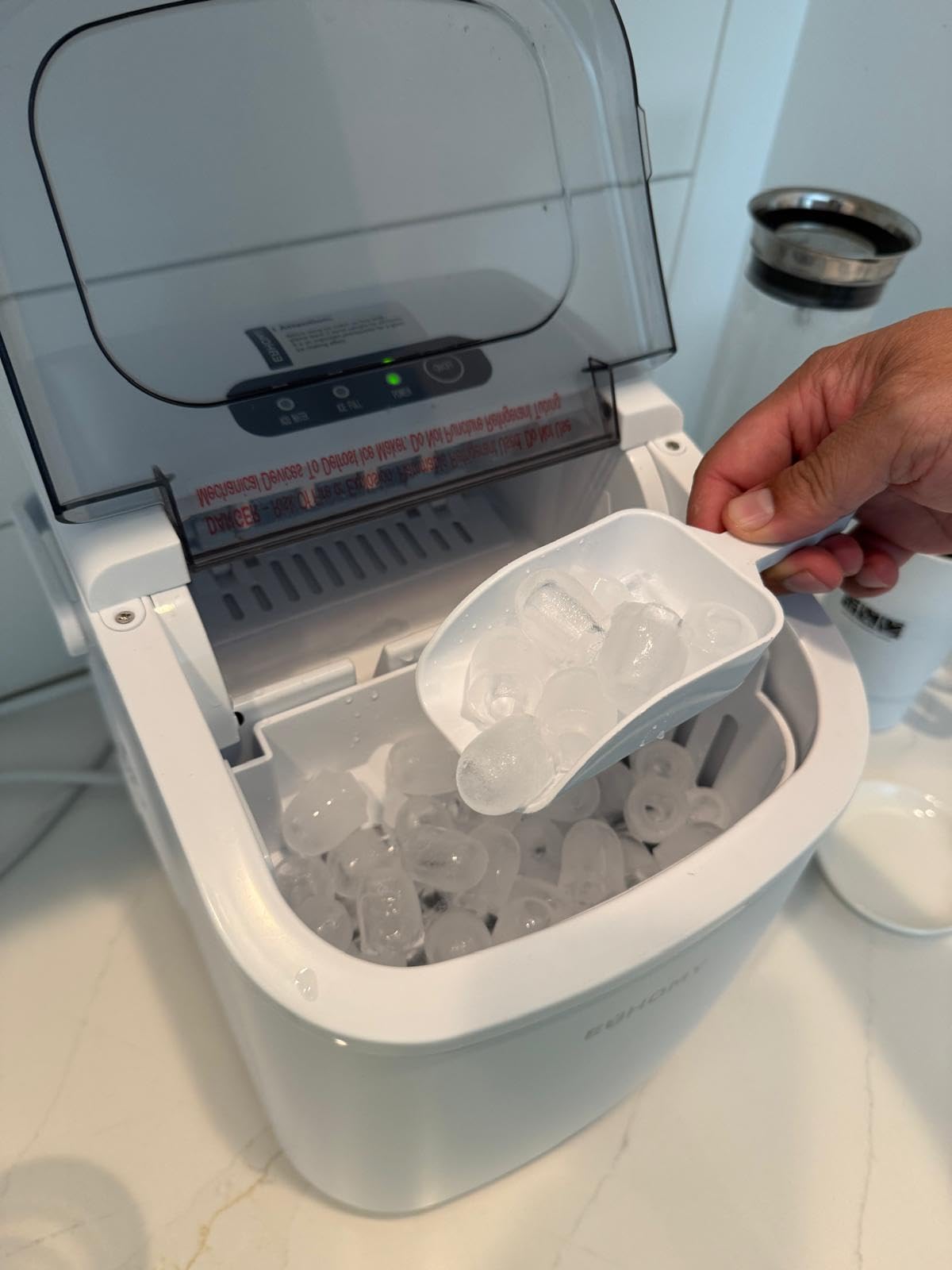 EUHOMY Countertop Ice Maker Machine with Handle, 26lbs in 24Hrs, 9 Ice Cubes Ready in 6 Mins, Auto-Cleaning Portable Ice Maker with Basket and Scoop, for Home/Kitchen/Camping/RV. (Black) customer photo 2