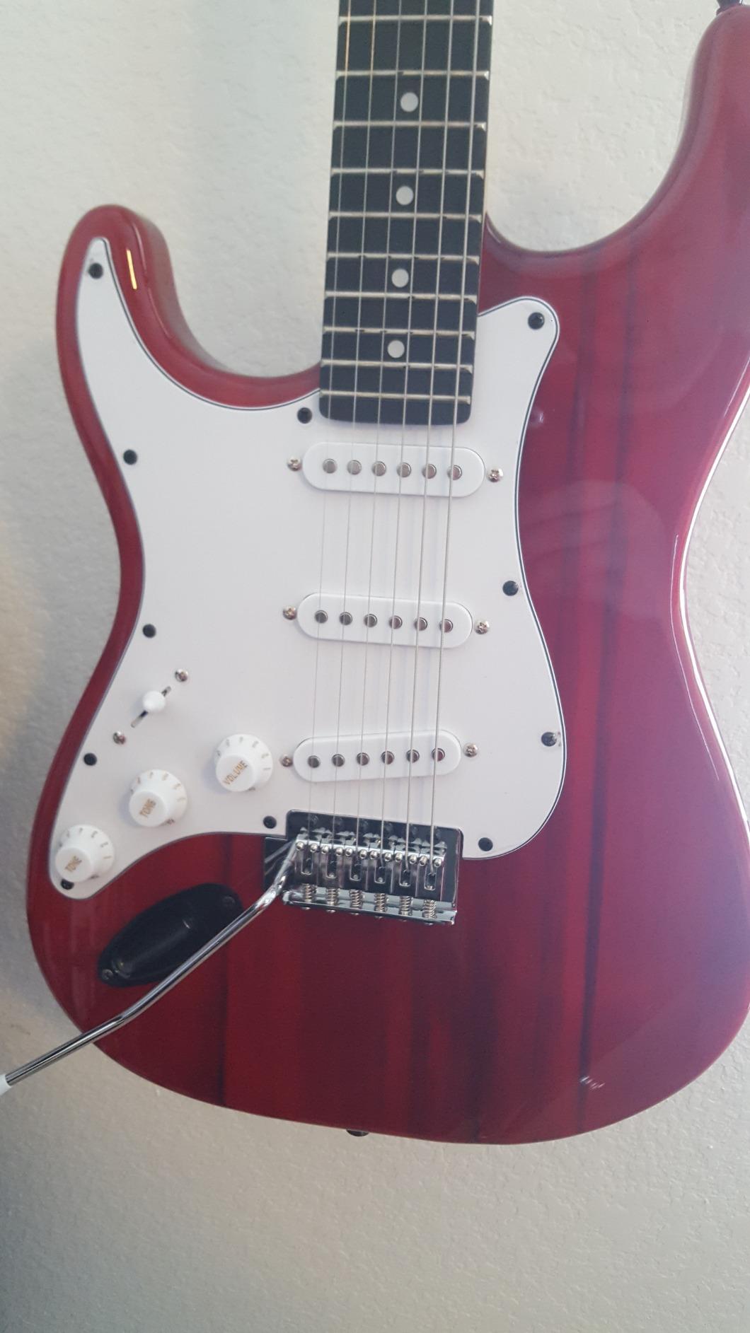 LyxPro Left Hand 39 Inch Electric Guitar and Starter Kit for Lefty Full Size Beginner’s Guitar, Amp, Six Strings, Two Picks, Shoulder Strap, Digital Clip On Tuner, Guitar Cable and Soft Case - Red customer photo 1