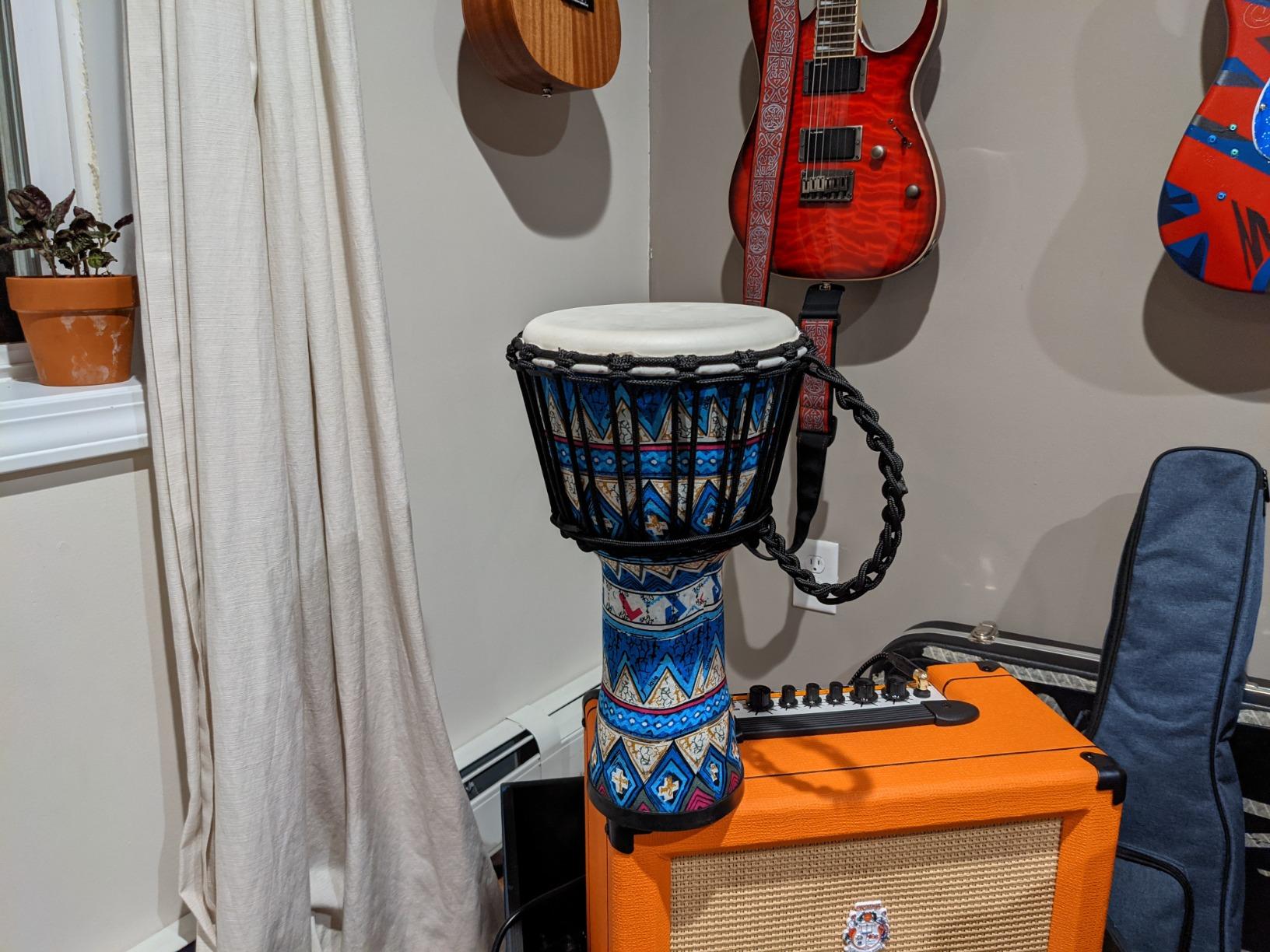 lotmusic African Djembe Drum, Standard 10'' Hand-Carved Mahogany Congo Drums, Professional Bongo Drum With Goatskin Drumhead for Adults customer photo 1